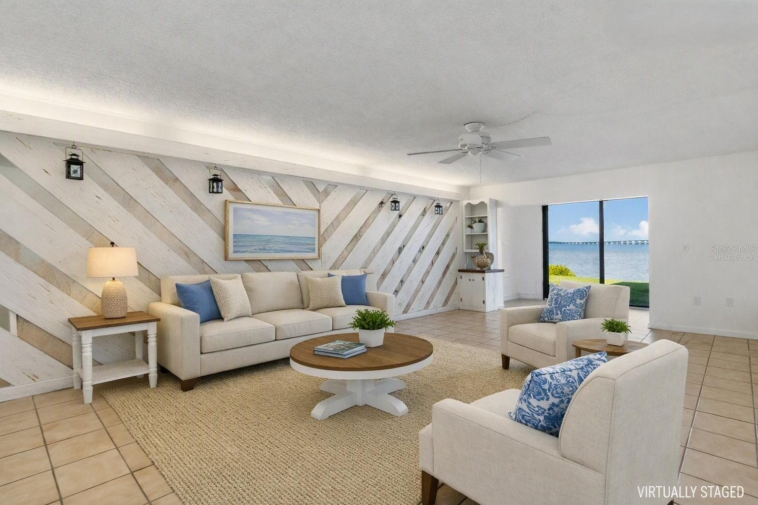 Virtually staged living area over looking water view - 2980 HAINES BAYSHORE RD #105, CLEARWATER
