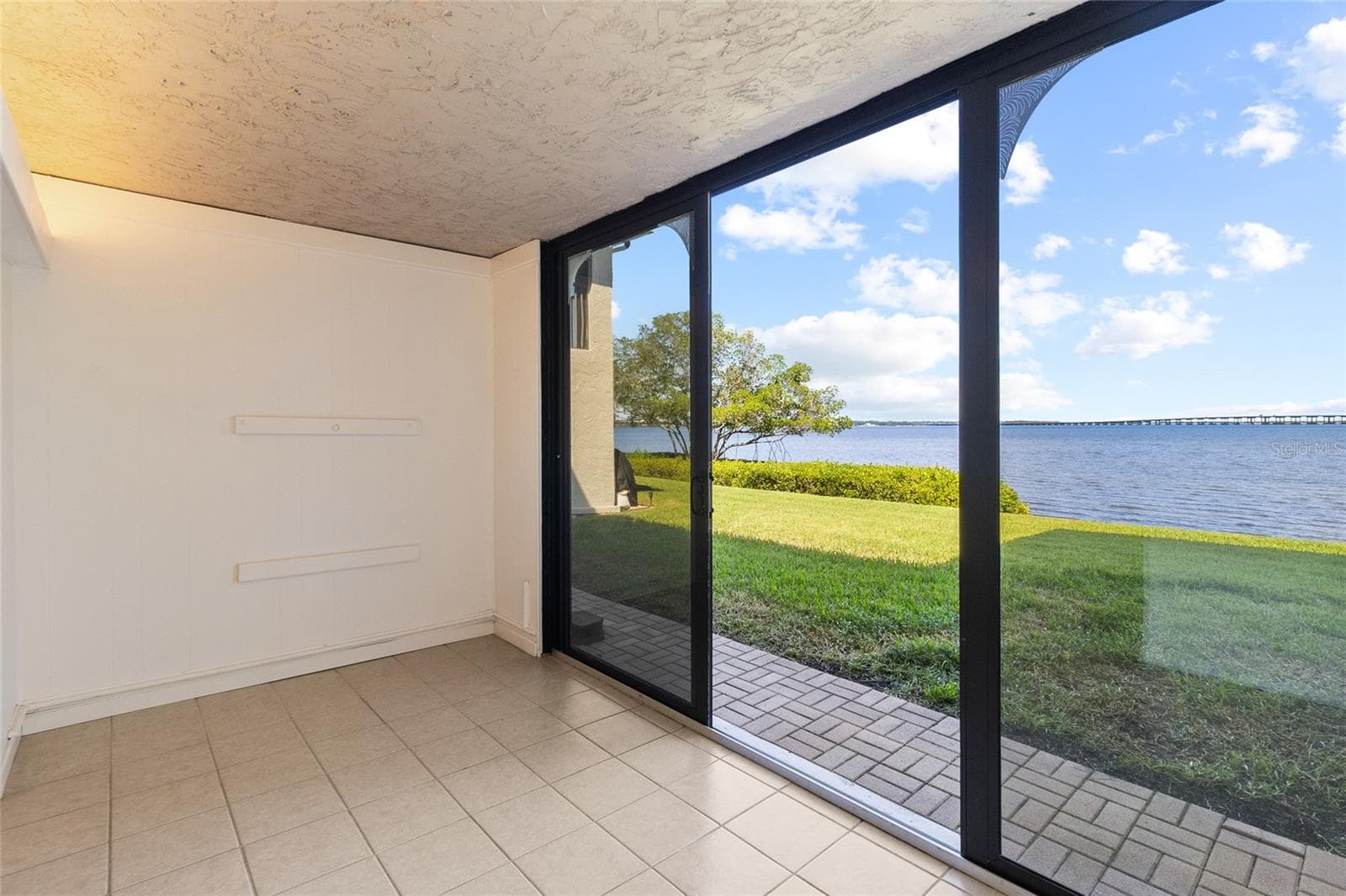 Sunroom with direct water views - 2980 HAINES BAYSHORE RD #105, CLEARWATER
