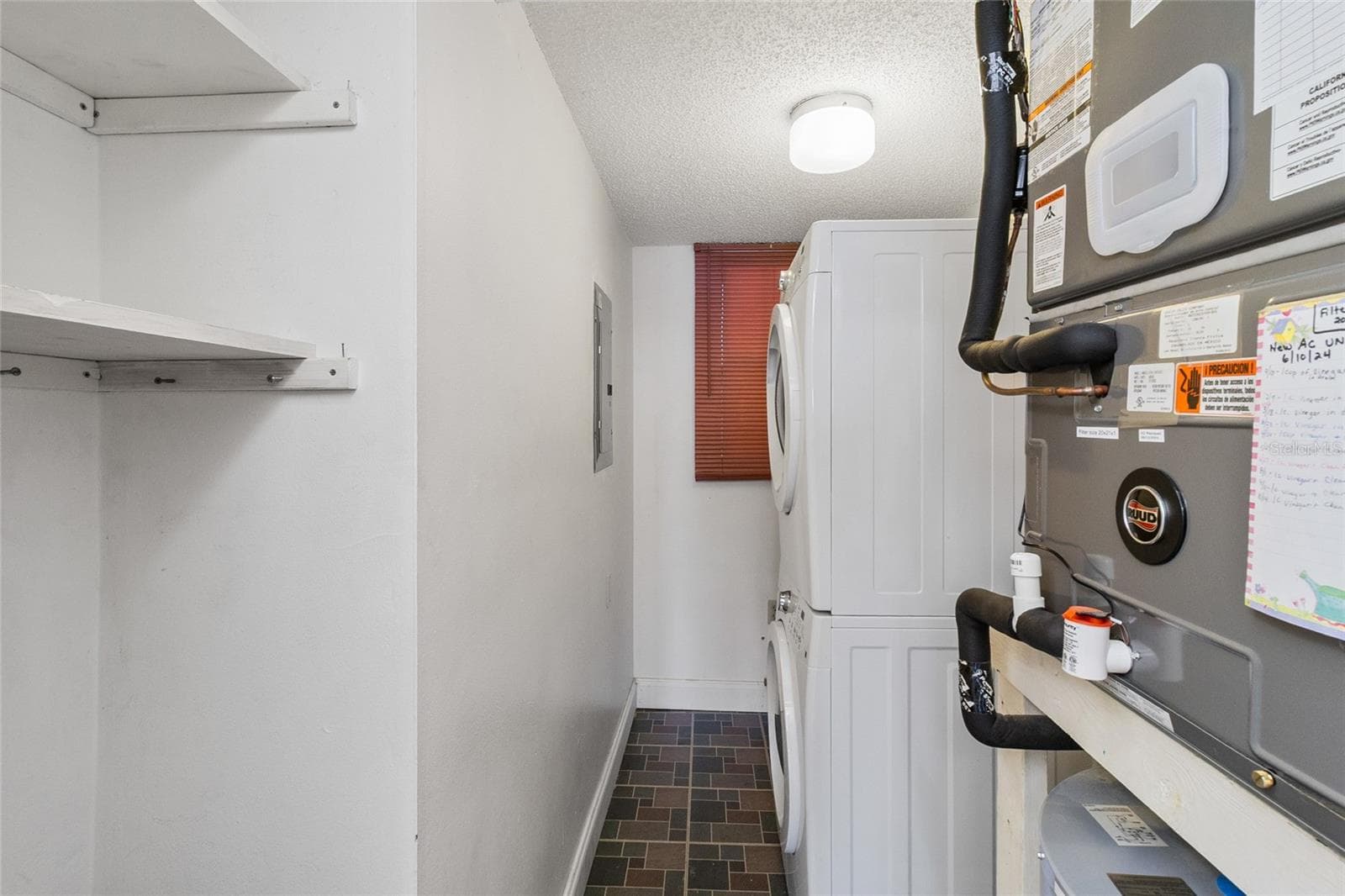Interior laundry room - comes with washer and dryer - 2980 HAINES BAYSHORE RD #105, CLEARWATER