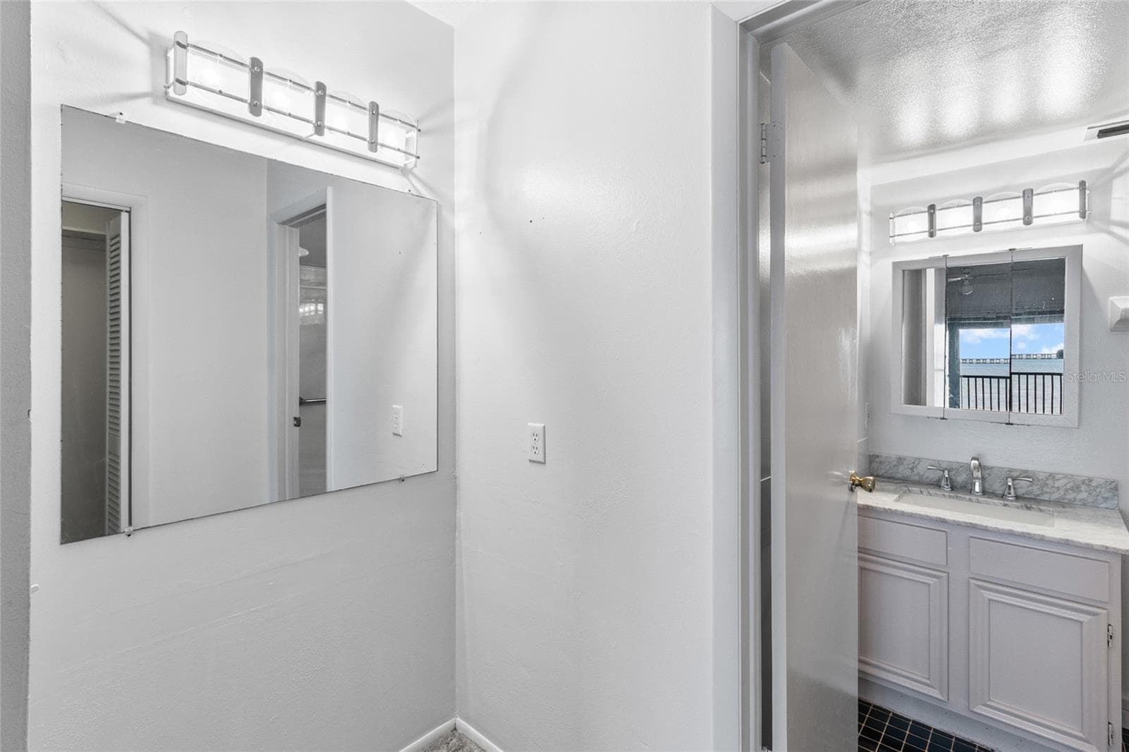 Dressing area looking toward primary suite - 2980 HAINES BAYSHORE RD #105, CLEARWATER