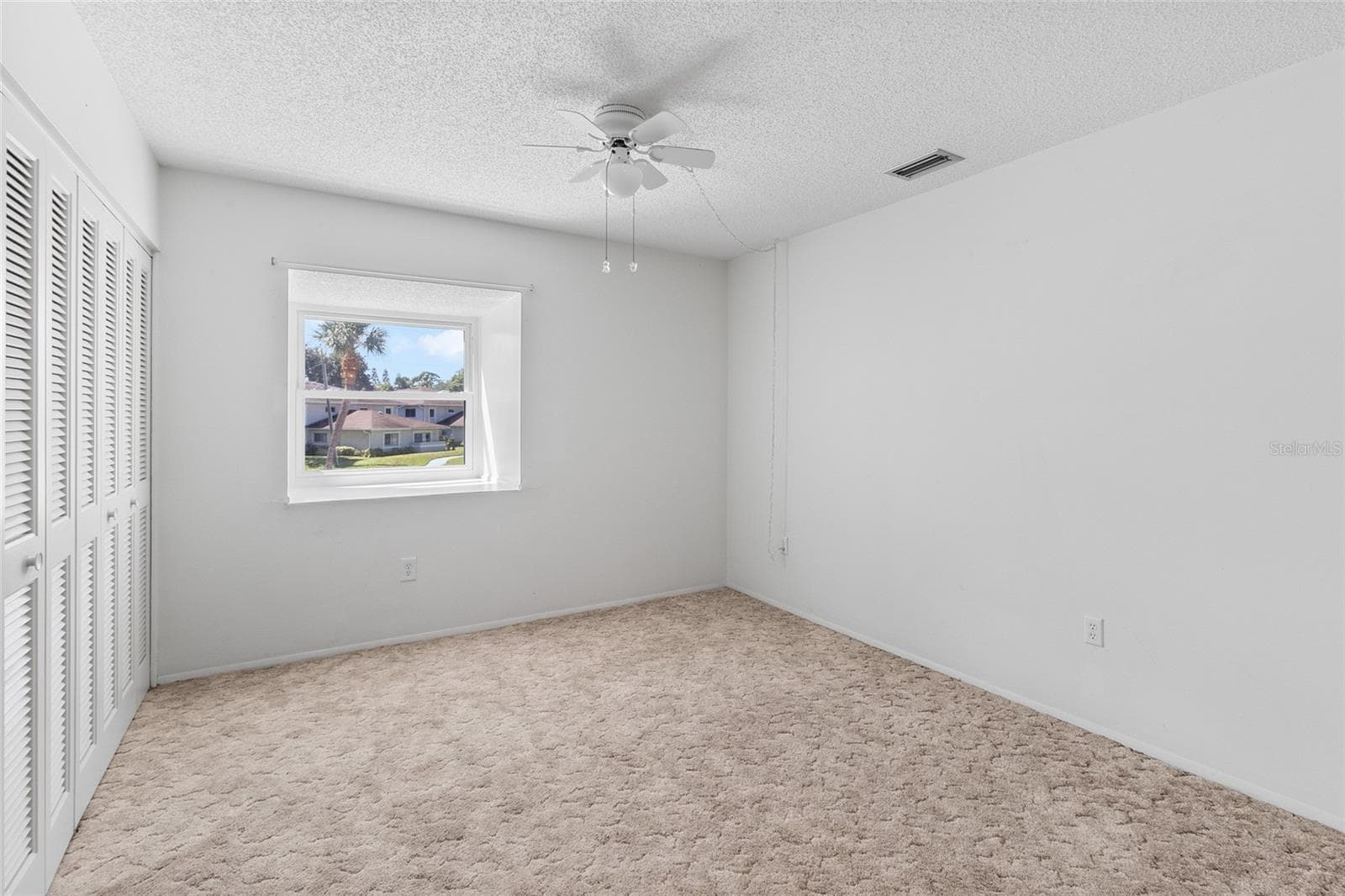 Secondary bedroom from door - 2980 HAINES BAYSHORE RD #105, CLEARWATER
