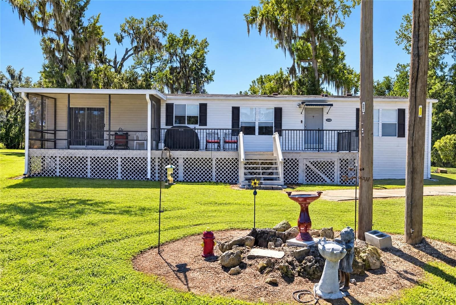 Manufactured Home at 12426 SE 55TH AVENUE RD, BELLEVIEW, photo 4 of 95
