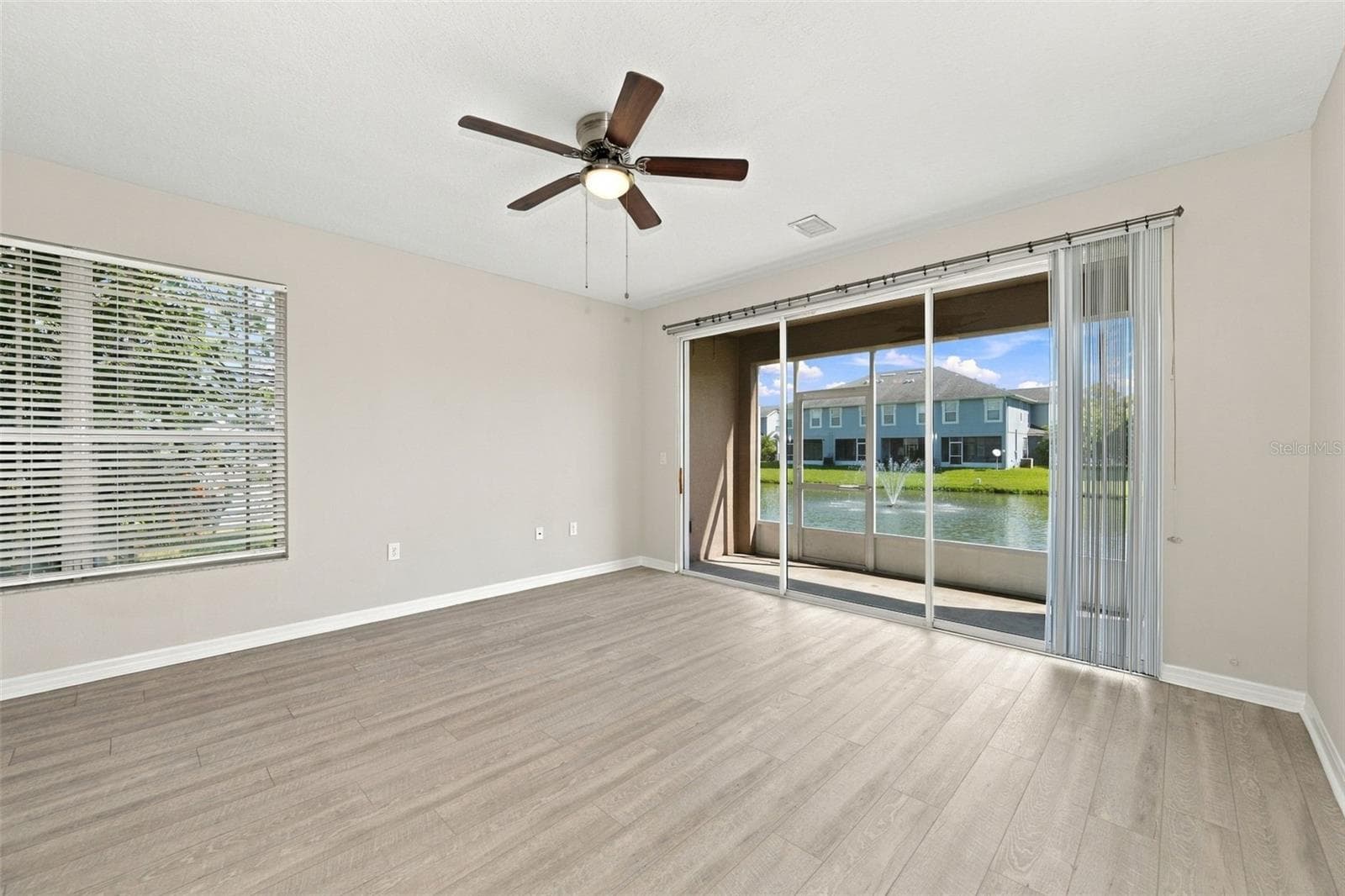 Living Room to Screened-In Patio - 10313 WILLOW LEAF TRL, TAMPA