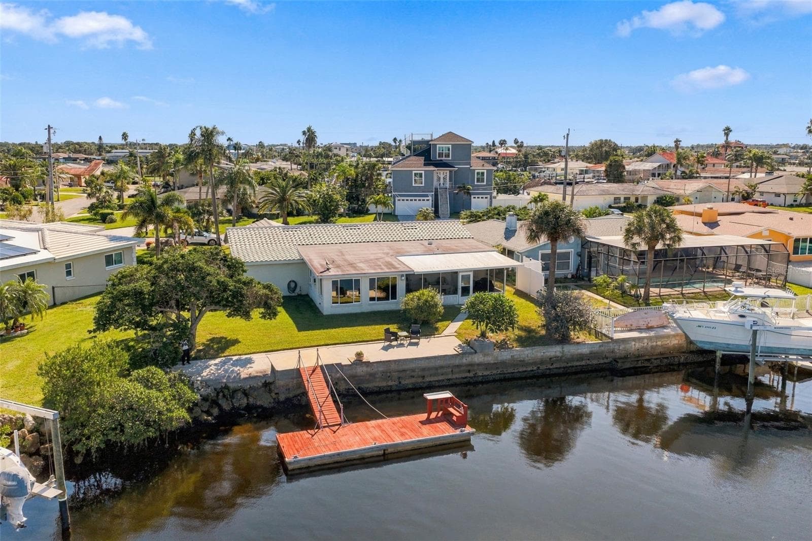 75 ft. concrete seawall. No bridges to the gulf. Direct gulf access with EASE - Large boats welcome! - 5513 BOWLINE BND, NEW PORT RICHEY