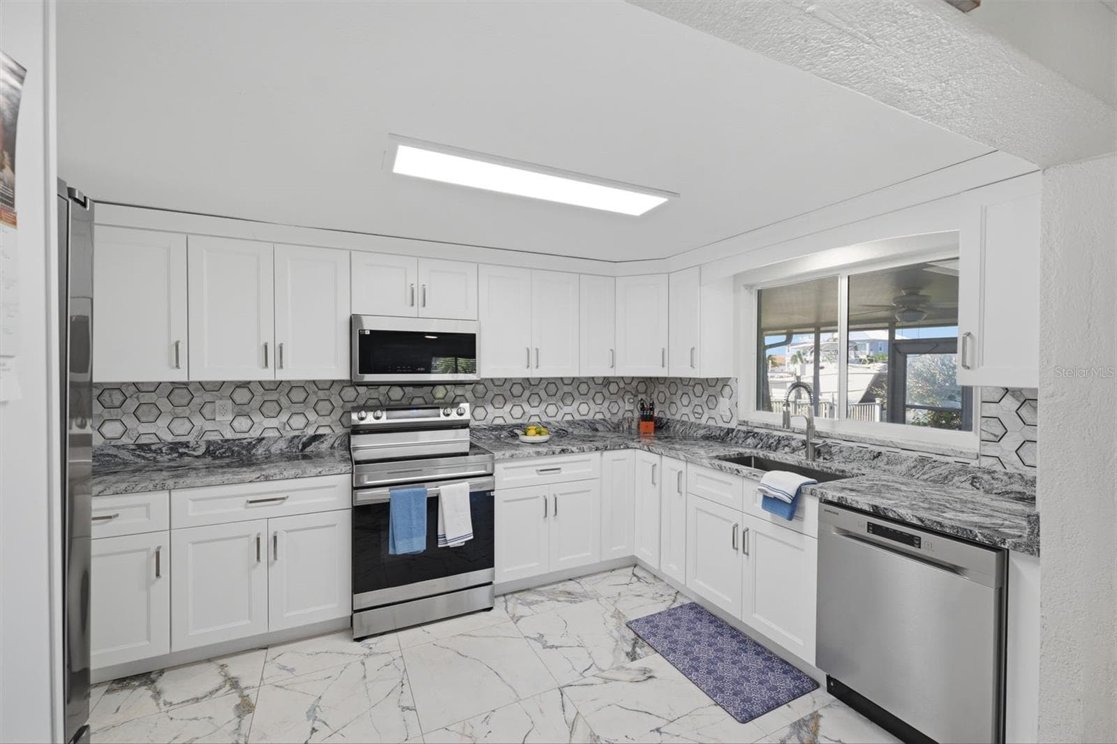 Abundant Kitchen cabinets. All new! Water view. - 5513 BOWLINE BND, NEW PORT RICHEY