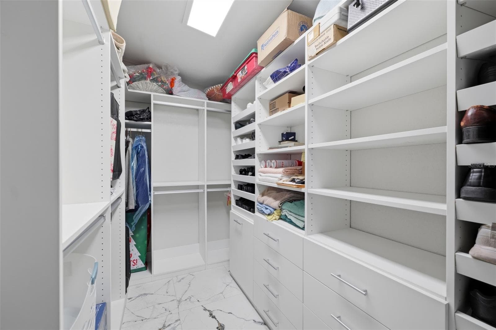 Designer lux closet - walk in. Over sized. This is ONE of TWO closets in the primary bedroom - 5513 BOWLINE BND, NEW PORT RICHEY