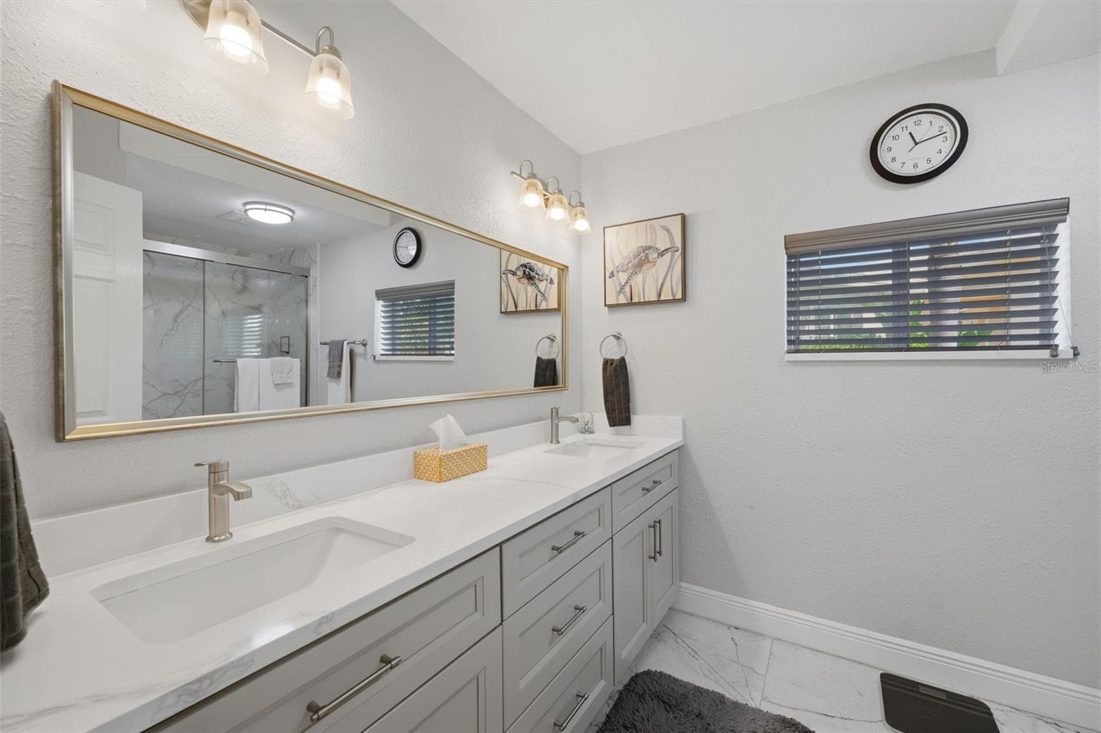Guest bath boast duel sinks, tub and shower. Everything is new! - 5513 BOWLINE BND, NEW PORT RICHEY