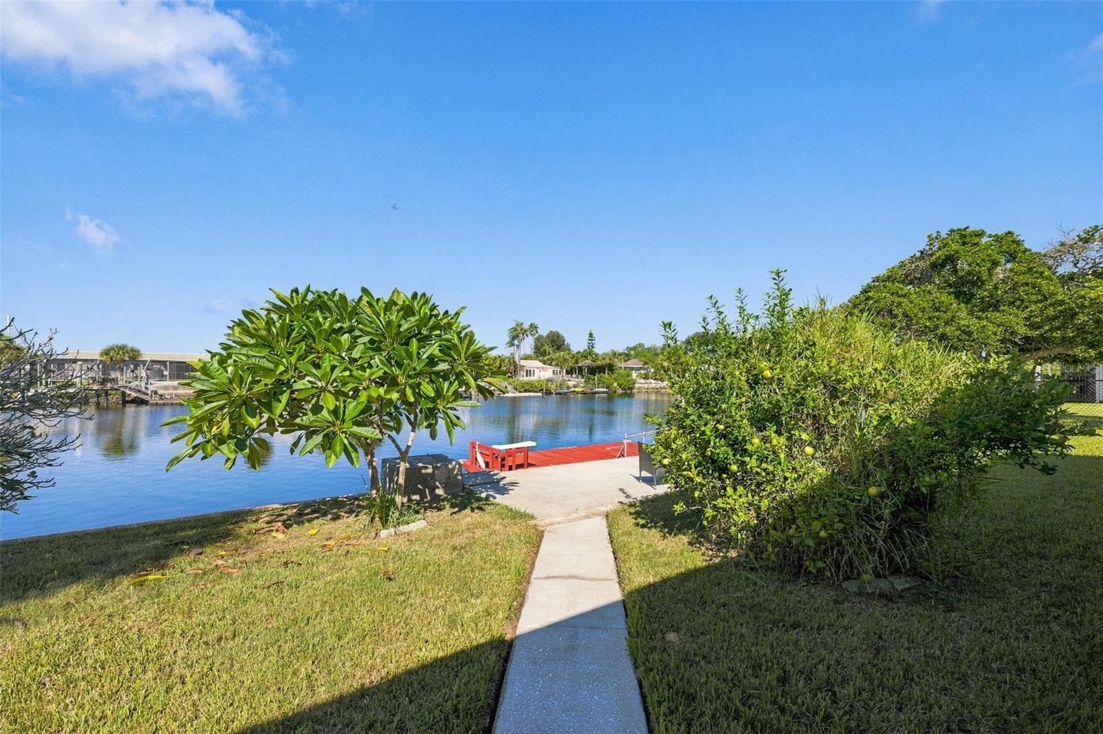 Concrete walkway to the floating dock. 75 ft. of concrete seawall - 5513 BOWLINE BND, NEW PORT RICHEY