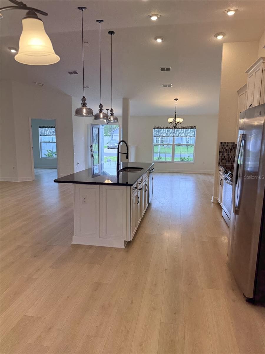 Cafe overlooking kitchen - 21 WOOD CLIFT LN, PALM COAST