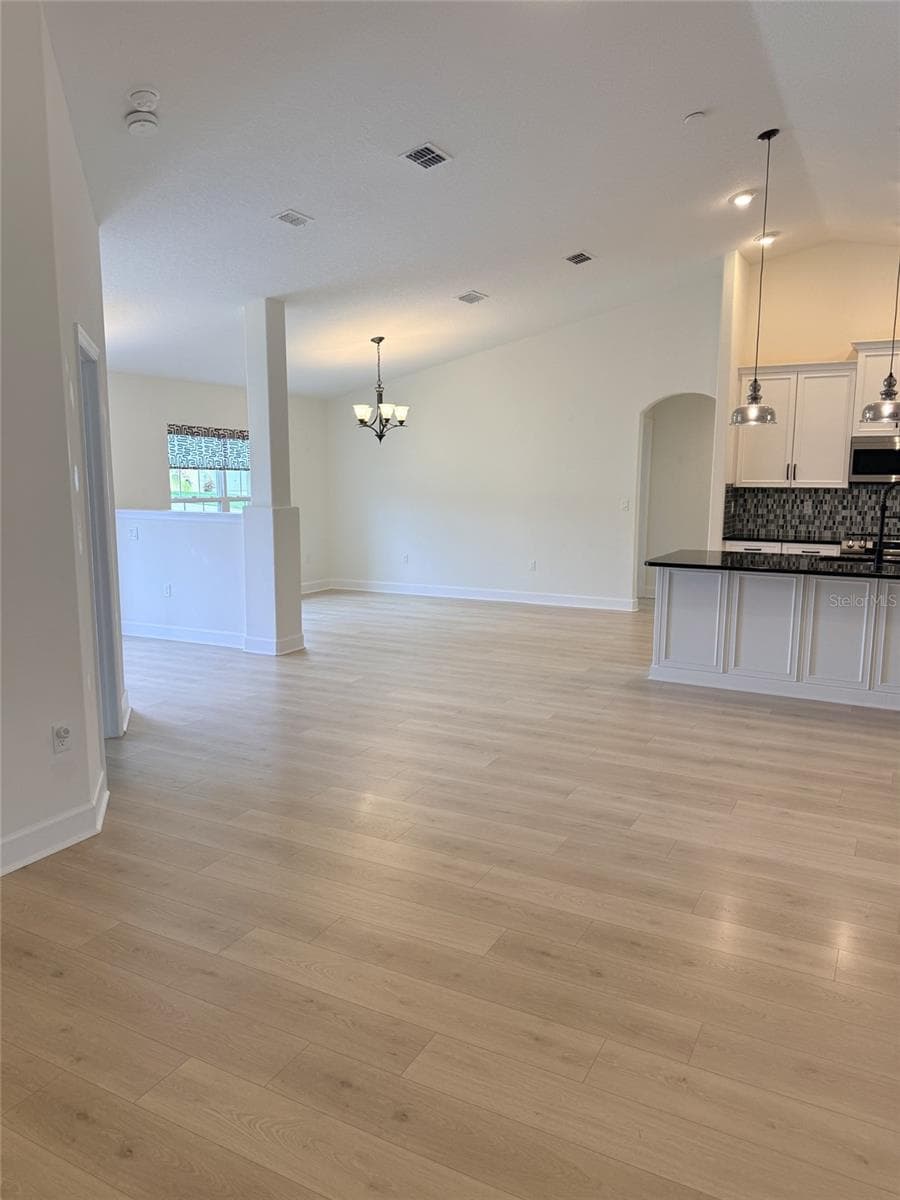 Family room overlooking kitchen - 21 WOOD CLIFT LN, PALM COAST