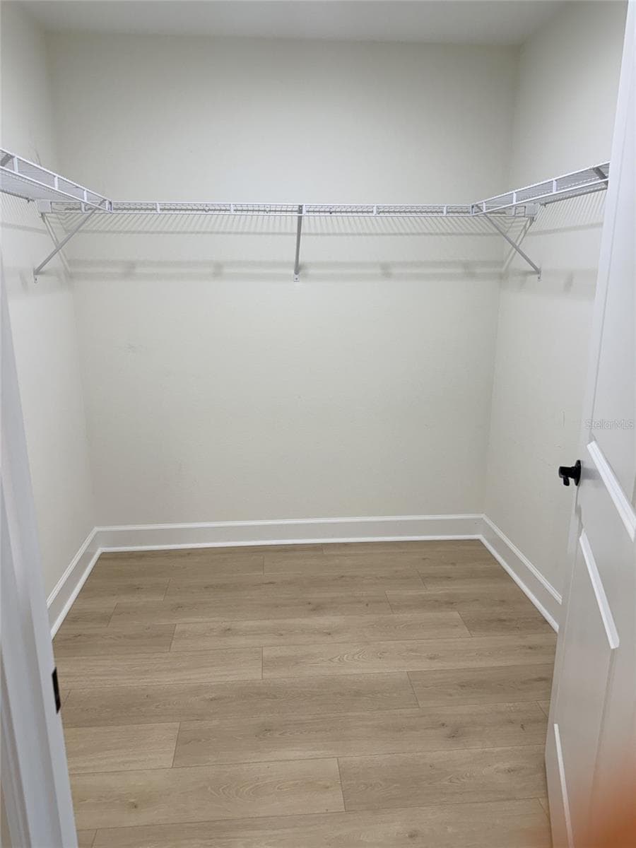 Primary bedroom closet 1 - 21 WOOD CLIFT LN, PALM COAST