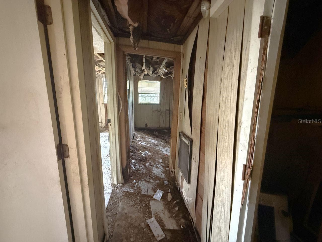 Hall to the primary bed and 2nd bed - 817 SE PINE AVE, FORT MEADE
