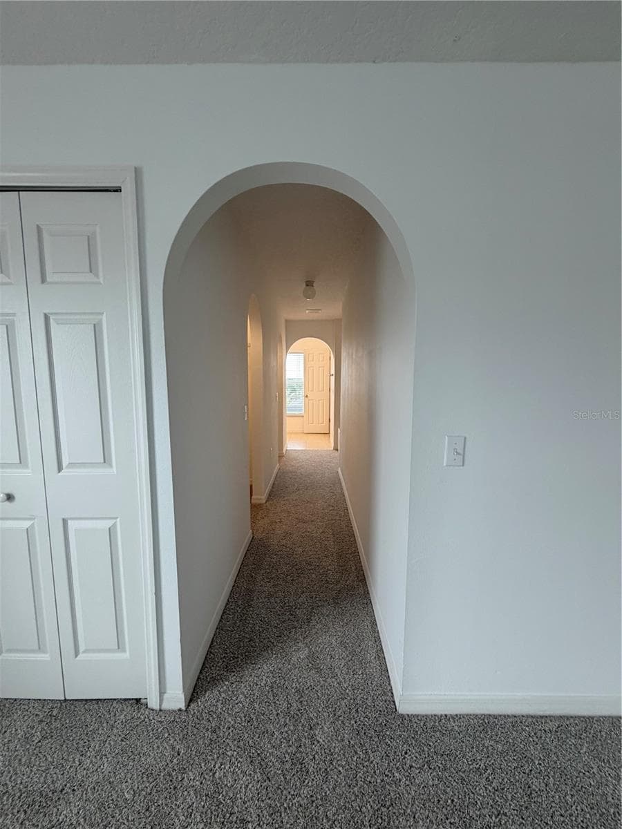 Master Bedroom view entrance to closets and bathroom - 247 BLAKE AVE, DAVENPORT