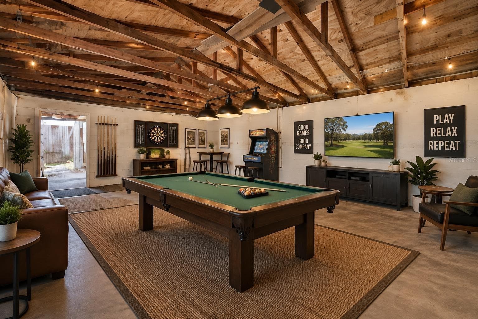 Workspace virtuallly staged as game room - 5106 THONOTOSASSA RD, PLANT CITY
