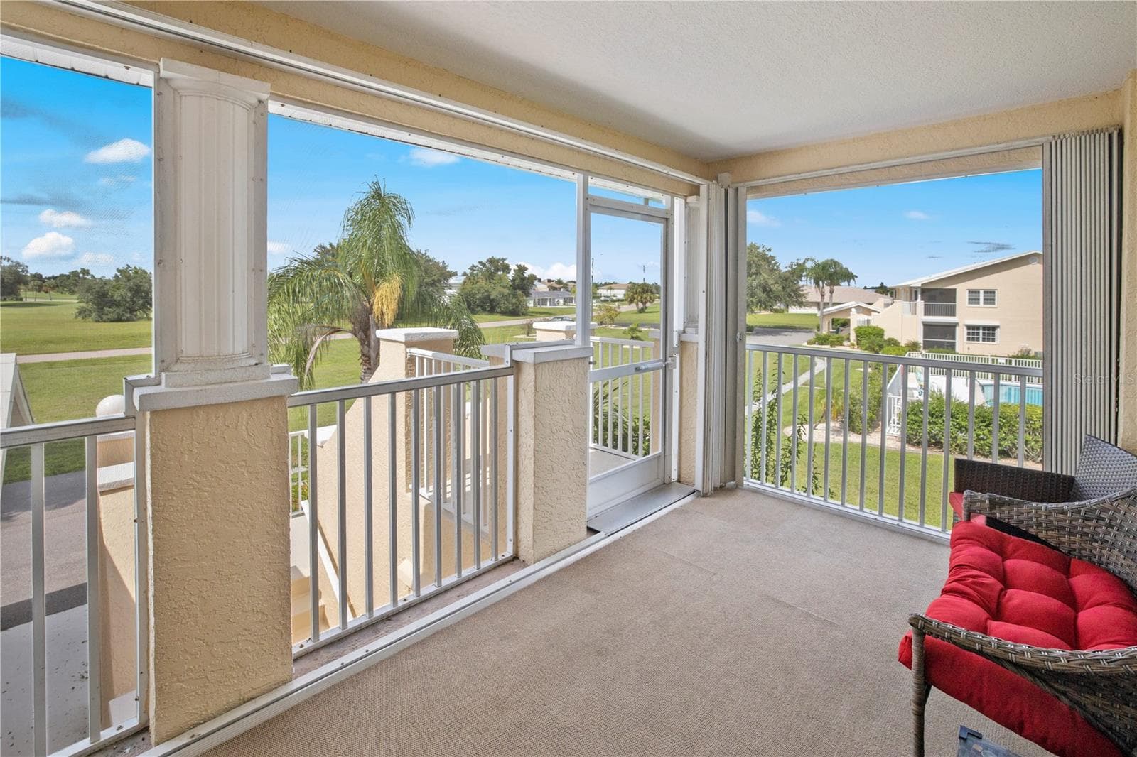 Large, 15ft Screened Front Entry with Accordian Shutters - 26283 NADIR RD #201, PUNTA GORDA