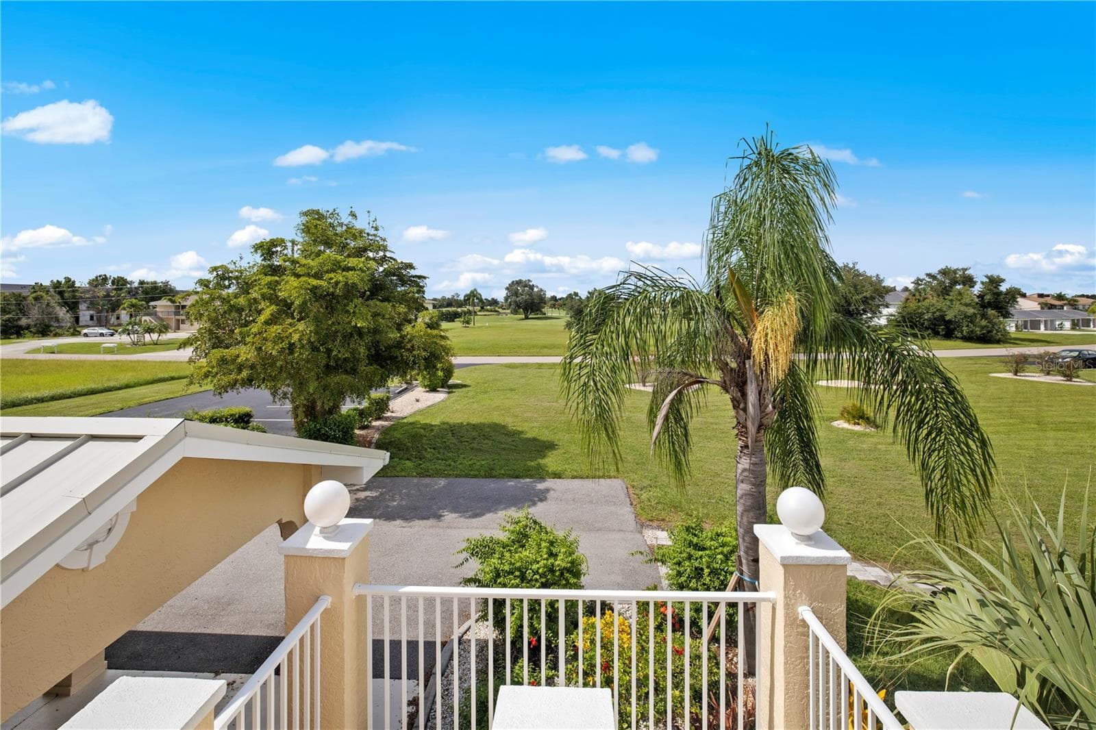 Front Entry Picturesque View of Deep Creek Golf Course - 26283 NADIR RD #201, PUNTA GORDA