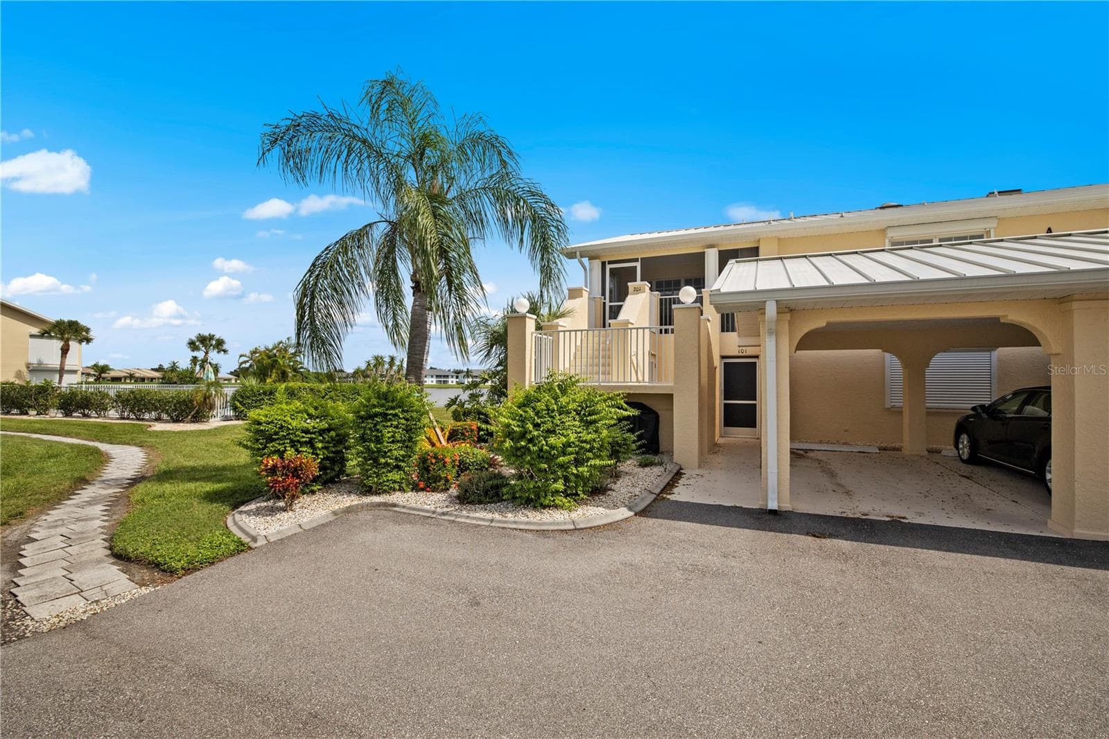 2nd Flr End Unit with Covered Parking - 2nd space - 26283 NADIR RD #201, PUNTA GORDA