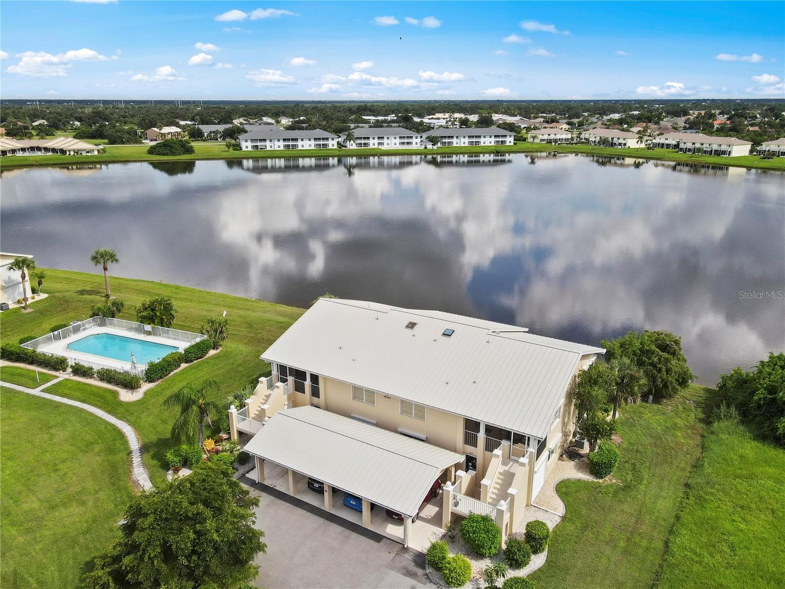 Welcome to Vista Del Largo in Deep Creek on Lake Rio - 26283 NADIR RD #201, PUNTA GORDA