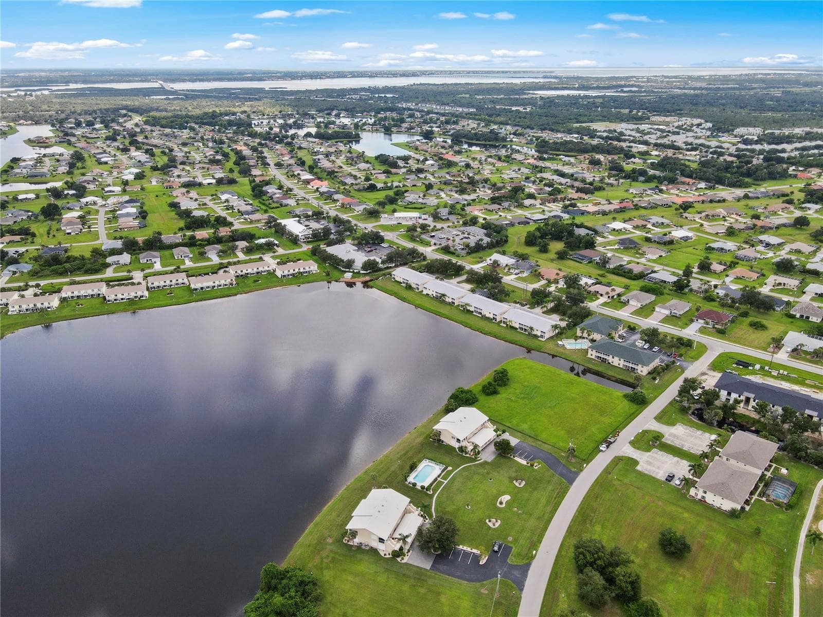 Welcome to Vista Del Largo in Deep Creek on Lake Rio - 26283 NADIR RD #201, PUNTA GORDA