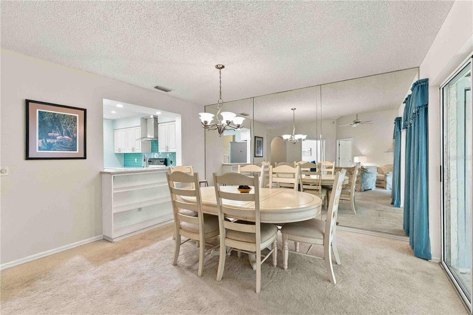 dining room with built in shelving - 6101 34TH ST W #22H, BRADENTON