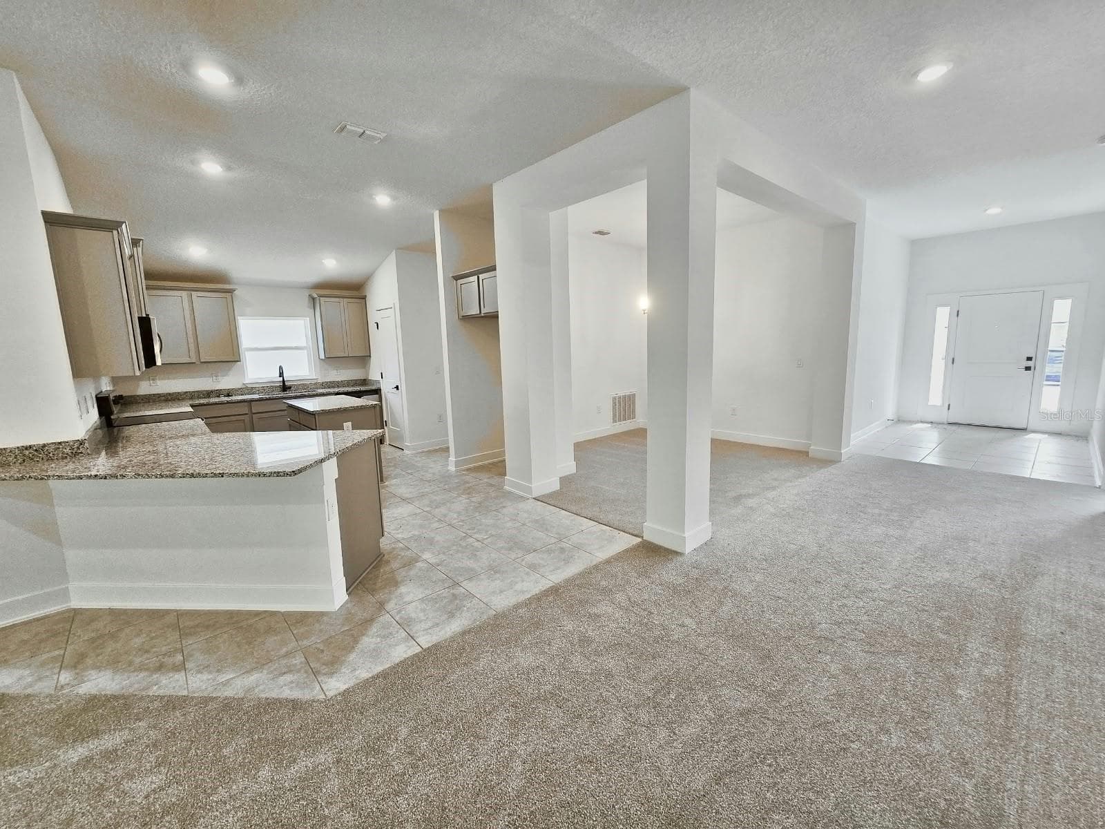 Kitchen, dining and foyer - 7660 BENT TREE LOOP, ST CLOUD