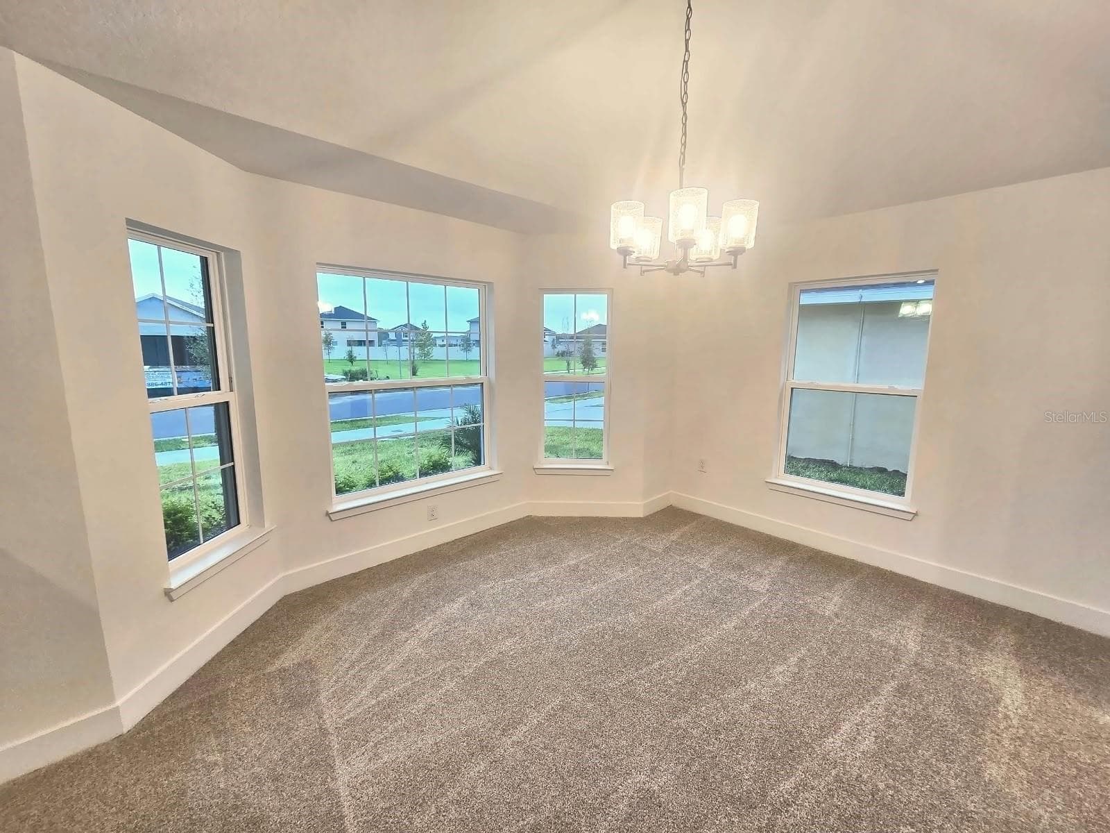 Dining room with bay windows - 7708 BENT TREE LOOP, ST CLOUD