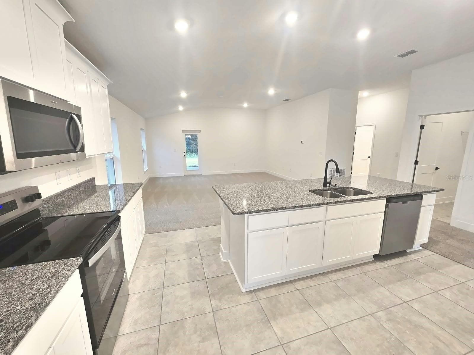 Kitchen and family room - 7708 BENT TREE LOOP, ST CLOUD