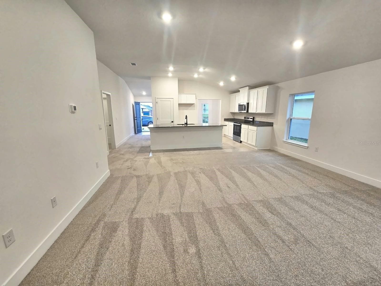 Family room and kitchen - 7708 BENT TREE LOOP, ST CLOUD