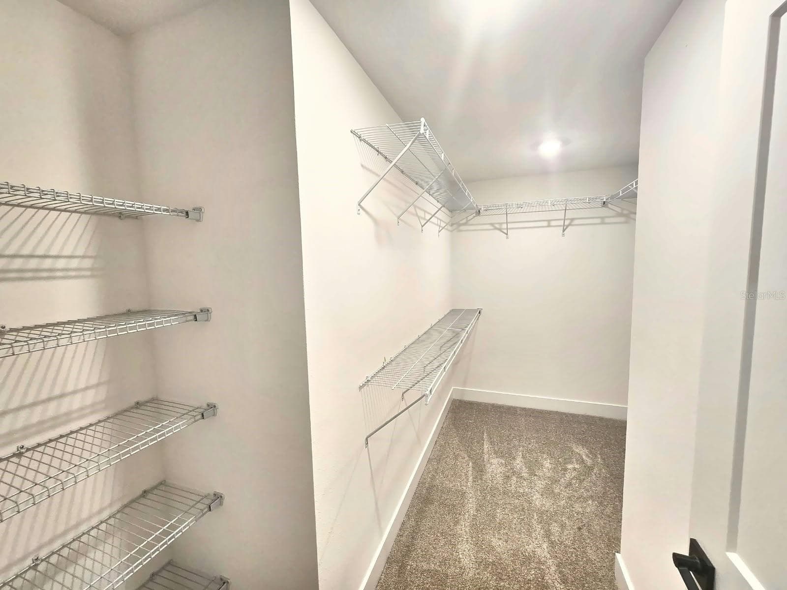 Primary walk-in closet - 7708 BENT TREE LOOP, ST CLOUD