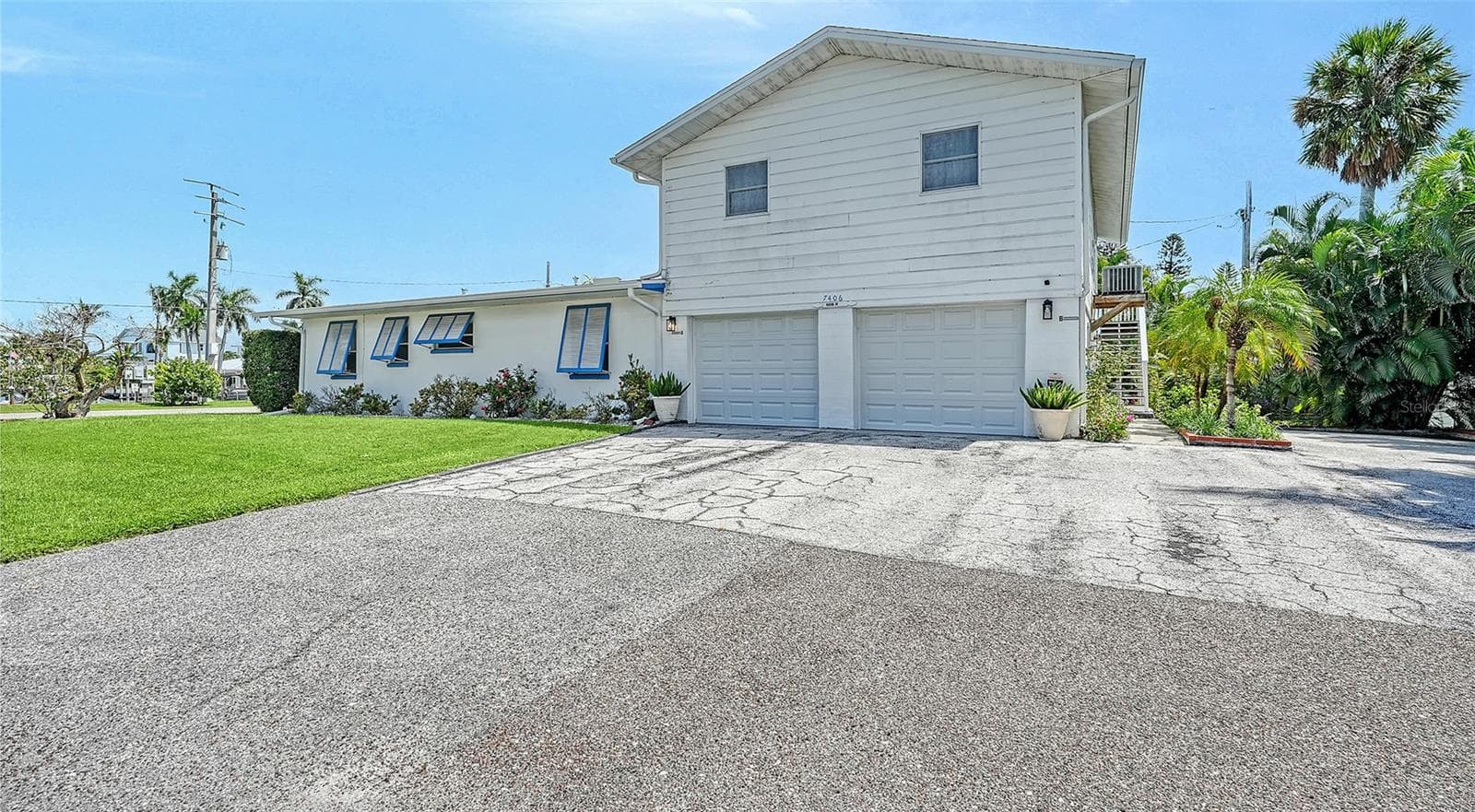 2 car garage for Apt A with side uncovered parking for Apt B - 7406 MARINA DR #A and B, HOLMES BEACH