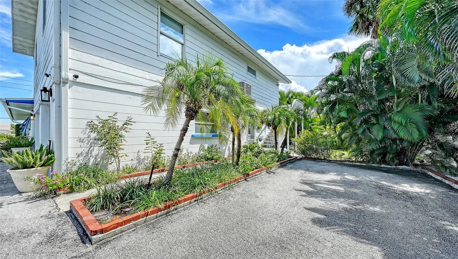 uncovered parking for Apt B - 7406 MARINA DR #A and B, HOLMES BEACH