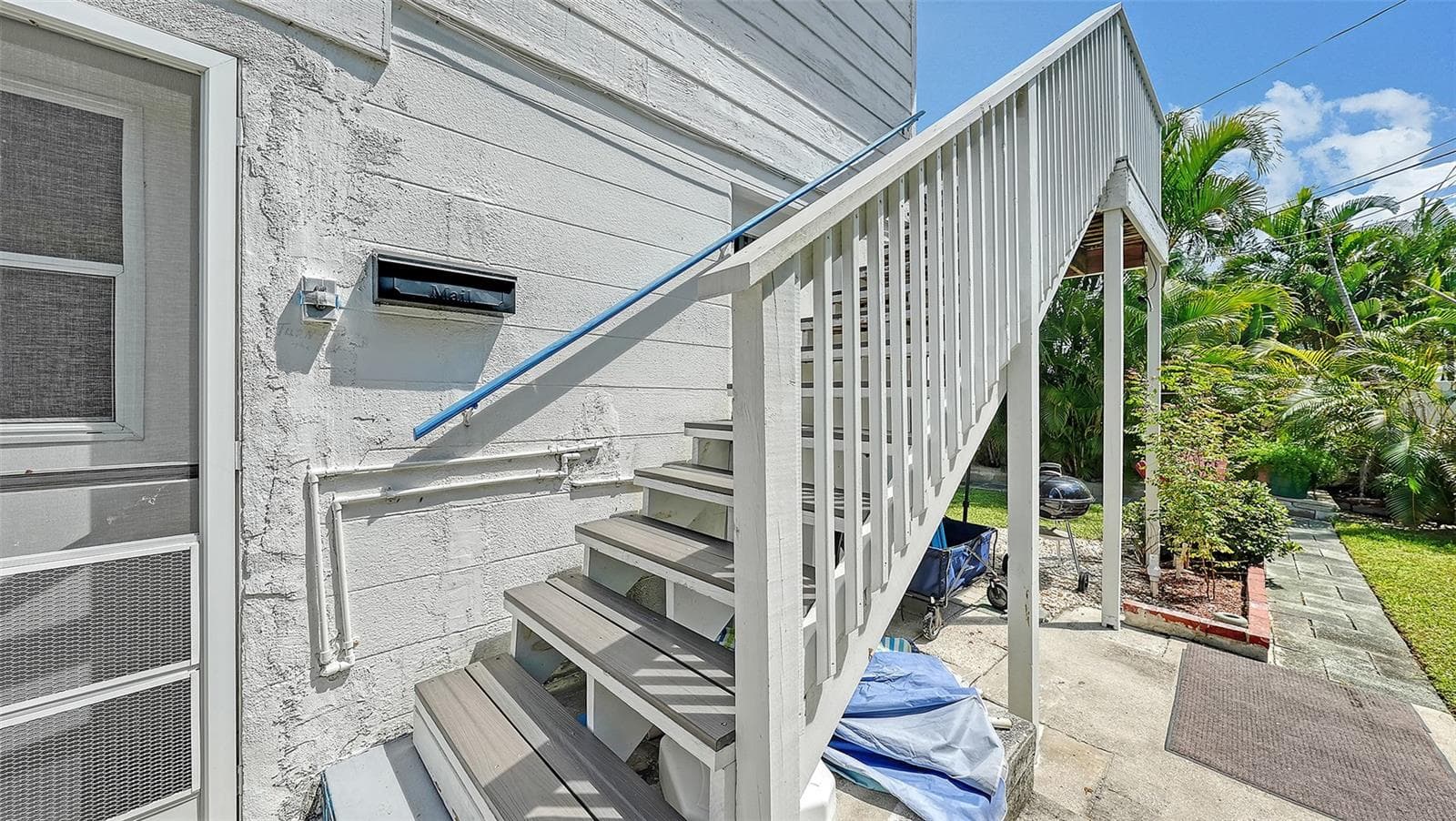 Side entrance up the stairs to Apt B - 7406 MARINA DR #A and B, HOLMES BEACH