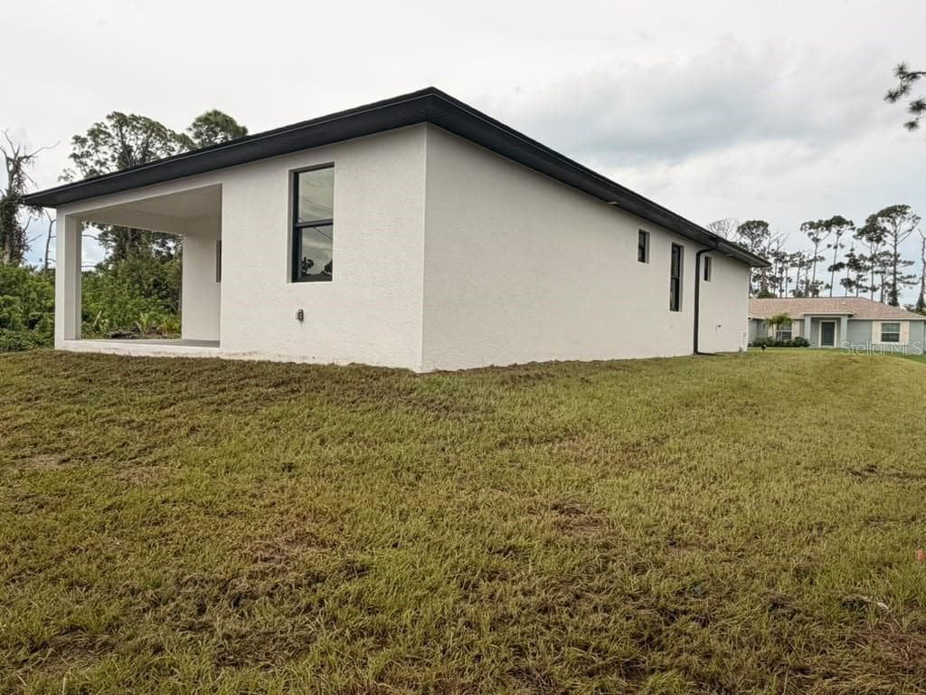 Single Family Residence at 13480 DRYSDALE AVE, PORT CHARLOTTE, photo 5 of 23