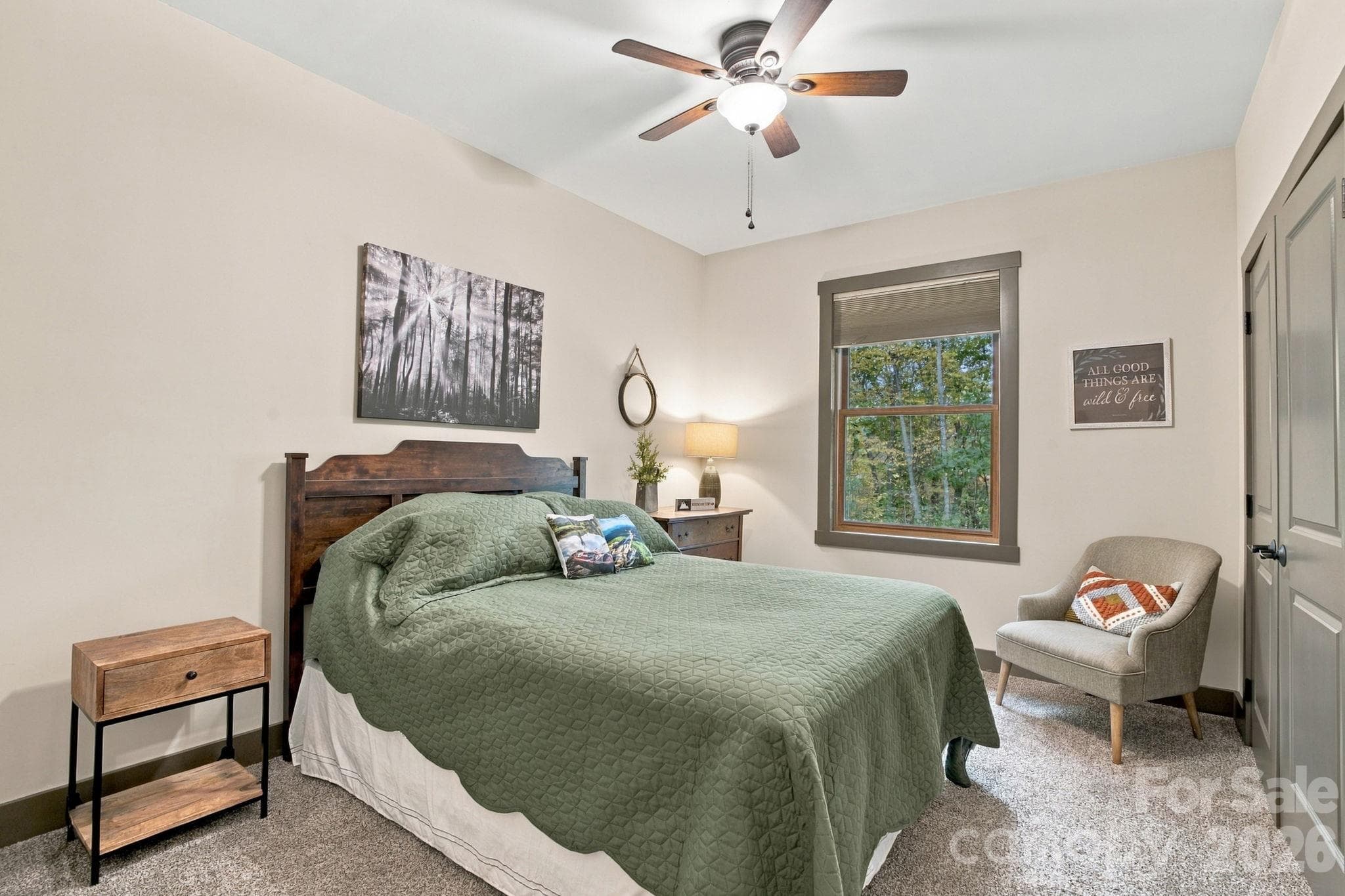 Second bedroom with ceiling fan, double door closet blinds, and plus carpet - 1206 River Stone Drive, Laurel Springs