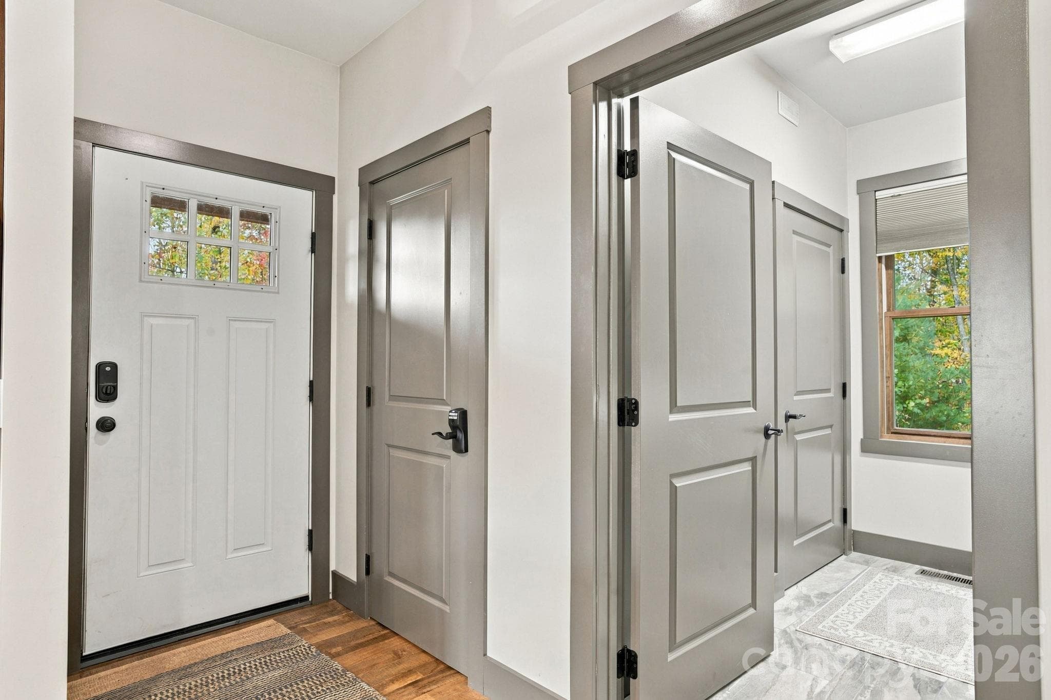 Foyer with walk in pantry and laundry room - 1206 River Stone Drive, Laurel Springs
