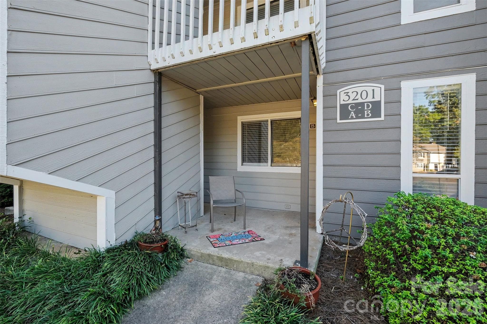 QUAINT COVERED PORCH ENTRY TO YOUR GROUND FLOOR HOME - 3201 Heathstead Place, Charlotte