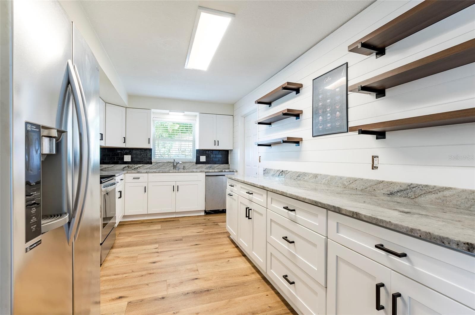 Single Family Residence at 1749 SUNSET POINT RD, CLEARWATER, photo 15 of 32