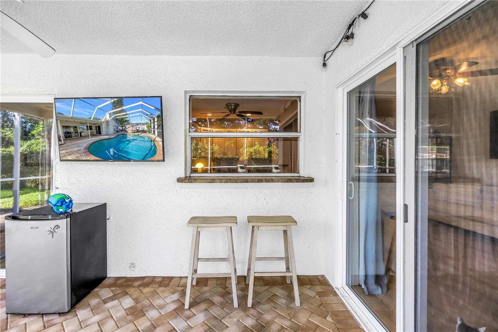 Covered Porch with Kitchen Bar - 2079 EGRET DR, PALM HARBOR