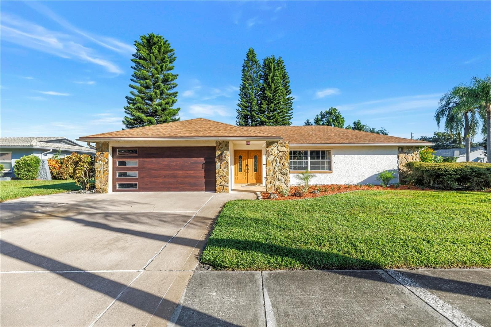 Front with New Garage Door - 2079 EGRET DR, PALM HARBOR
