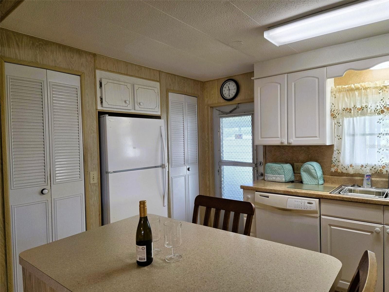 Kitchen features 3 pantry closets - 3308 OVER CUP OAK TER, SARASOTA