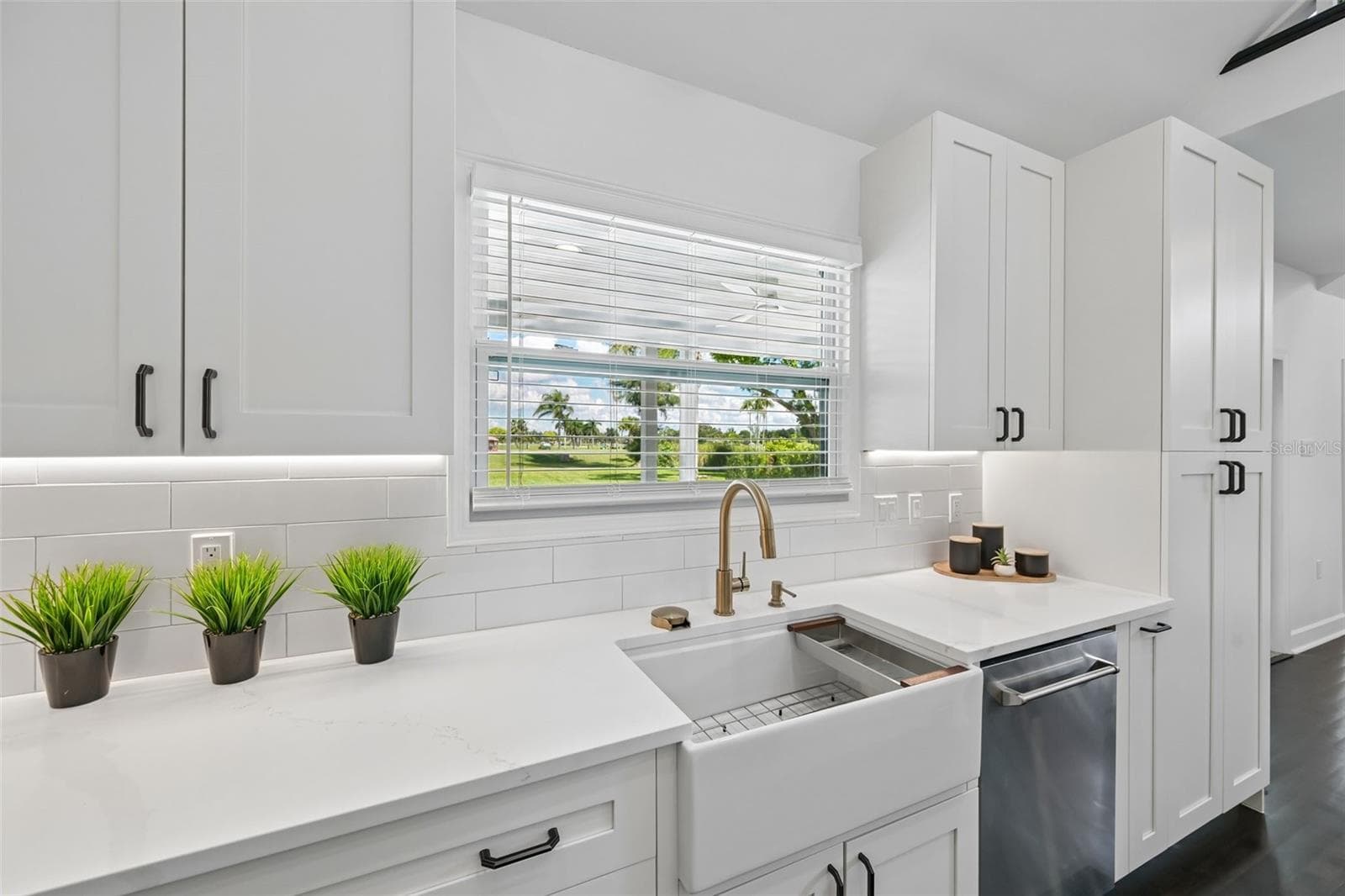 The kitchen is filled with natural light. - 5060 18TH AVE W, BRADENTON