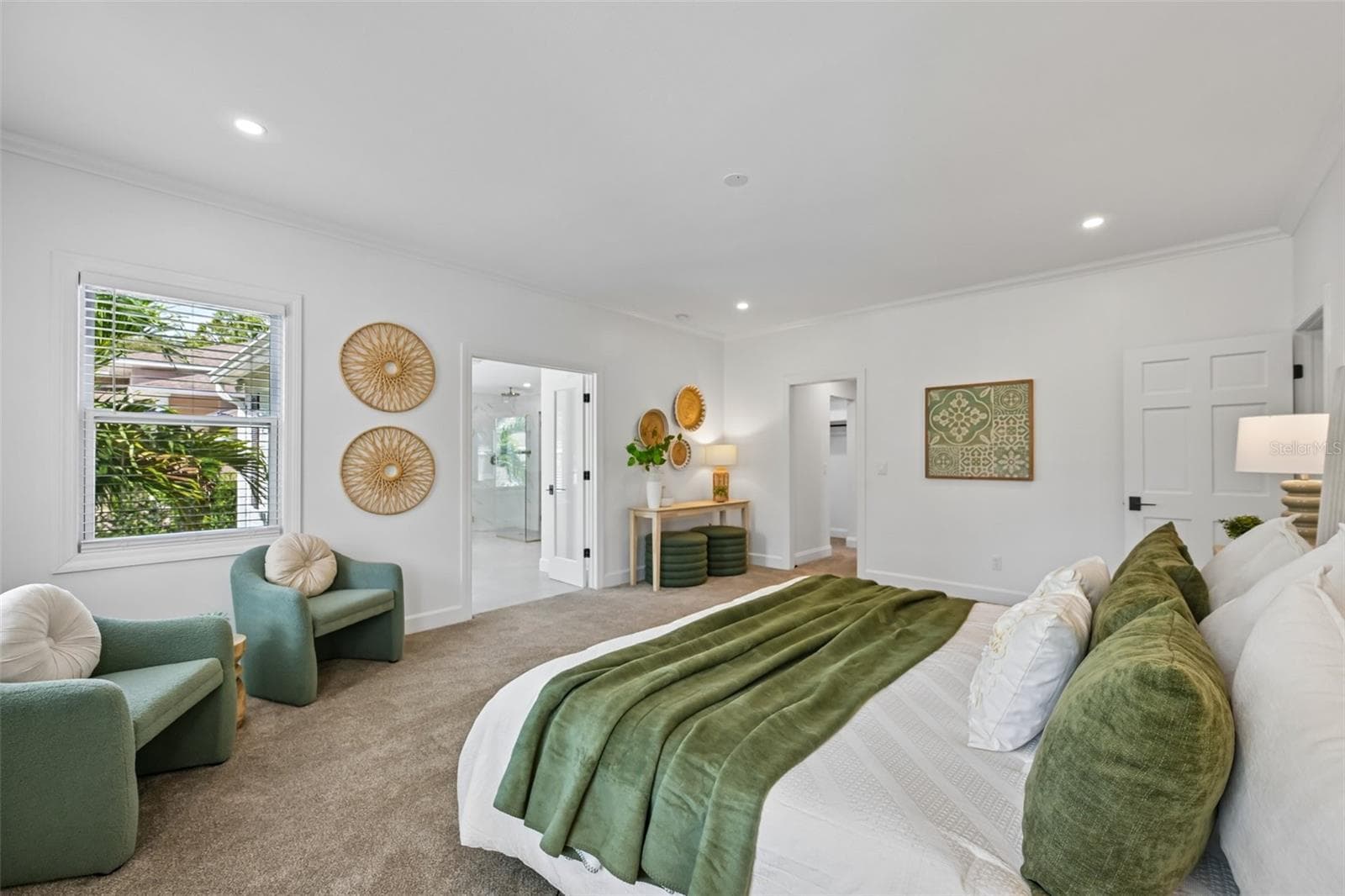 Primary Bedroom is spacious and light filled. It is on the first floor of the home. - 5060 18TH AVE W, BRADENTON