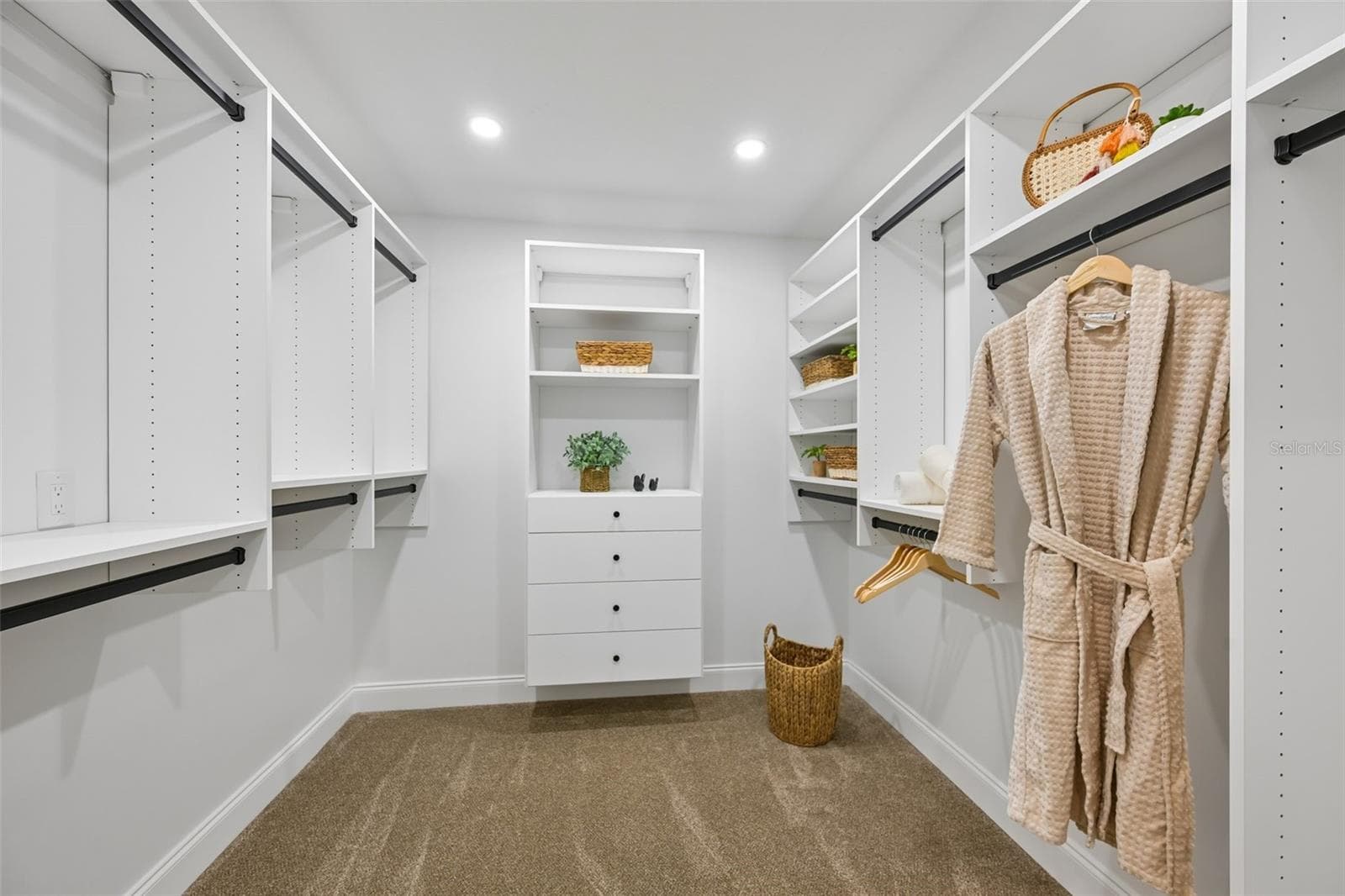 1st walk-in closet with California Closet system in the primary suite - 5060 18TH AVE W, BRADENTON