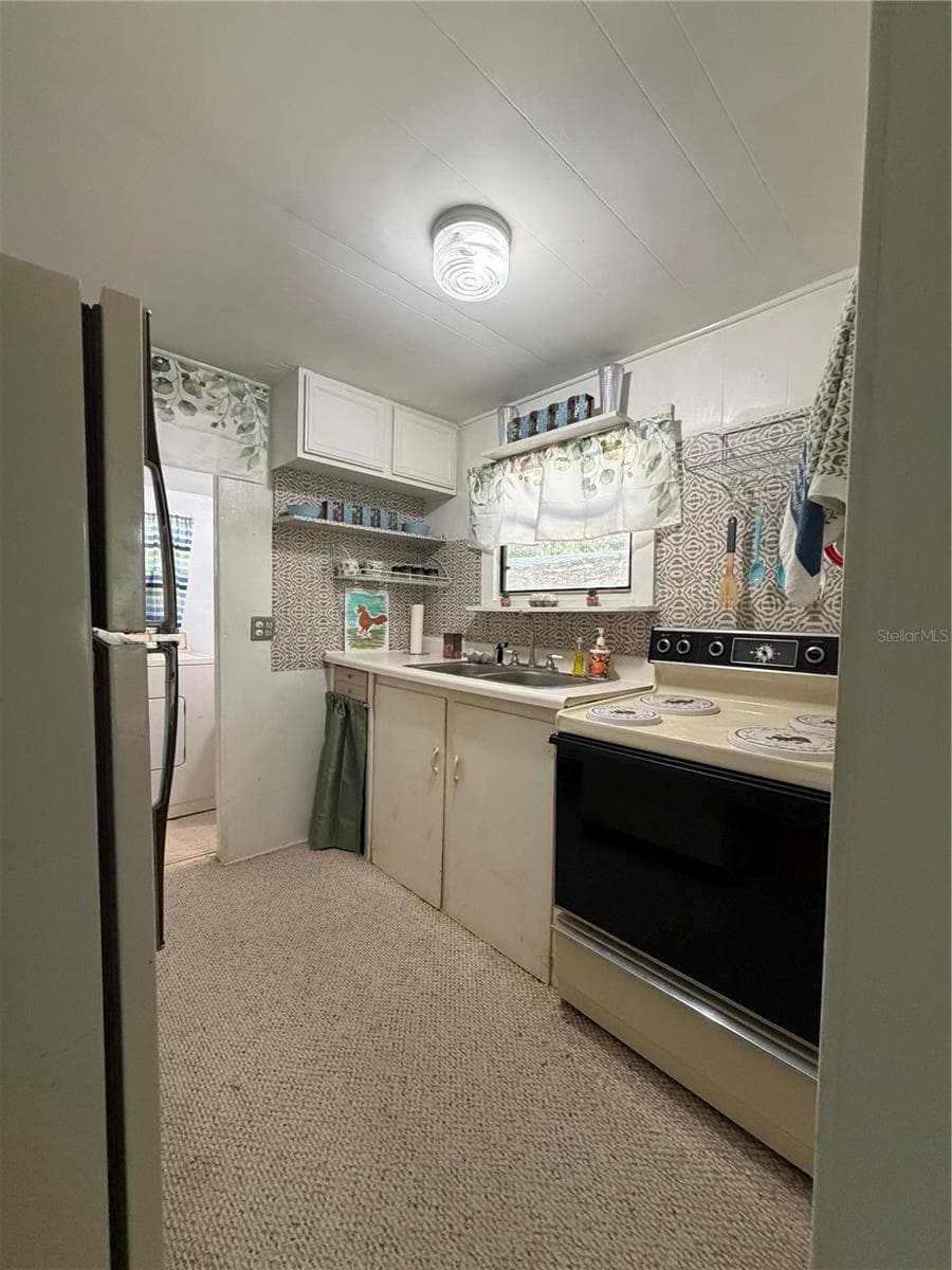 Single Family Residence at 20800 NE 146TH TER, FORT MC COY, photo 5 of 24
