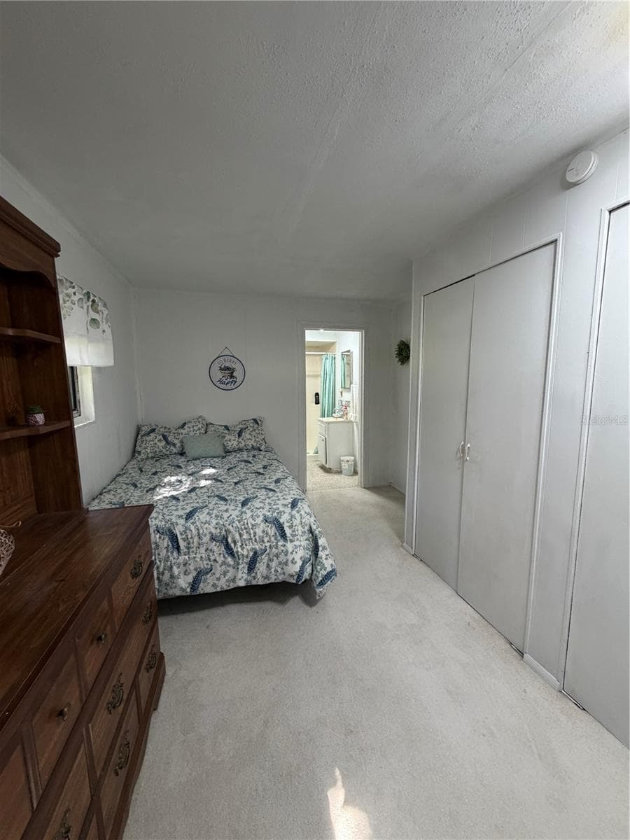 Single Family Residence at 20800 NE 146TH TER, FORT MC COY, photo 10 of 24