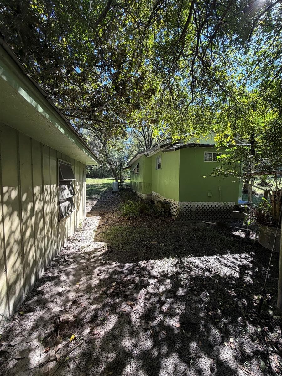 Single Family Residence at 20800 NE 146TH TER, FORT MC COY, photo 19 of 24