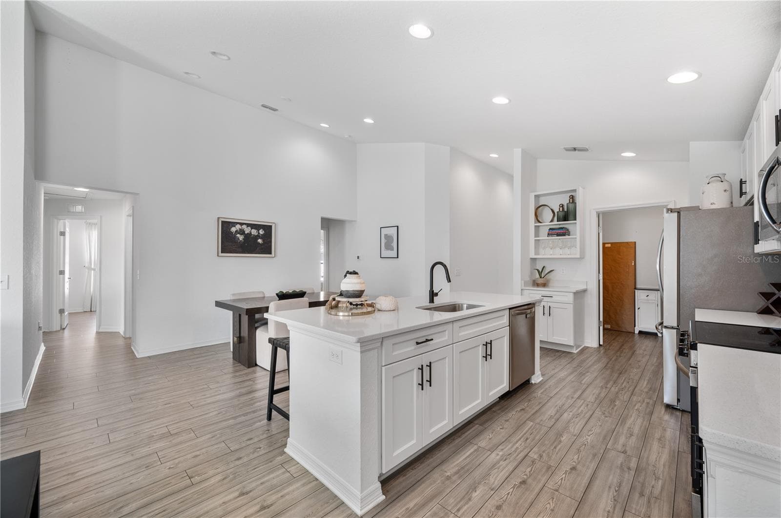 In the rear of this photo is a great Laundry room with plenty of storage - 1279 PINTAIL PL, LAKELAND