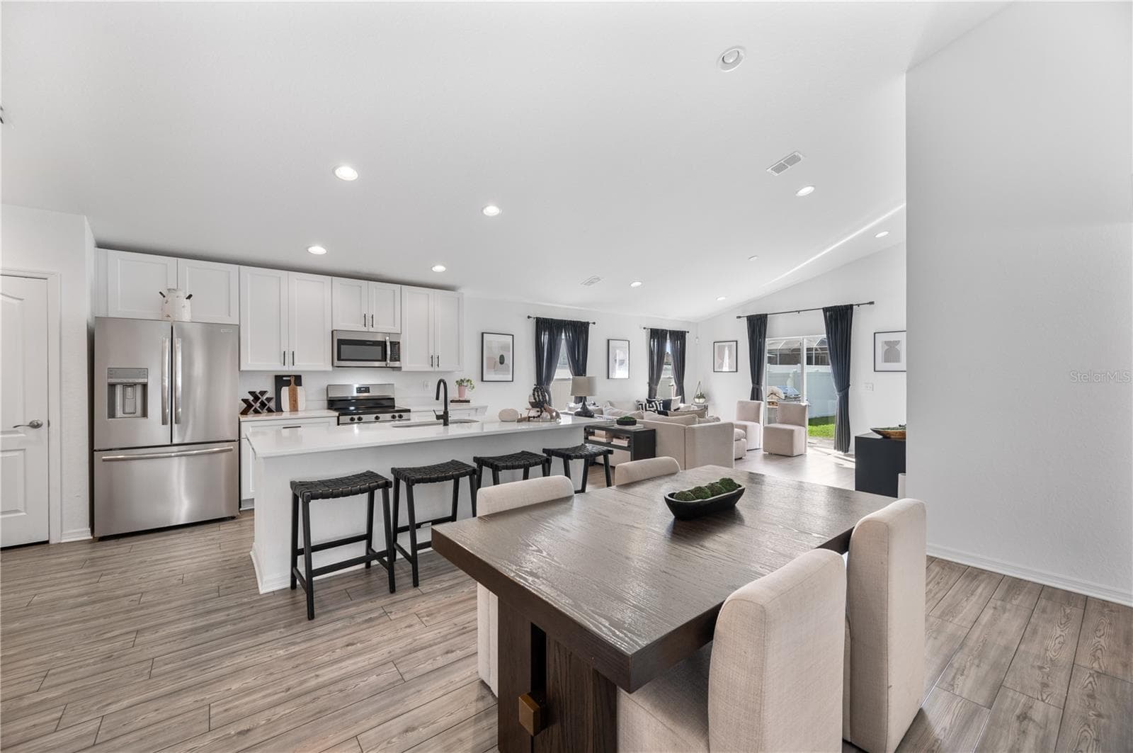 An expansive view form the dining room into the great room. - 1279 PINTAIL PL, LAKELAND