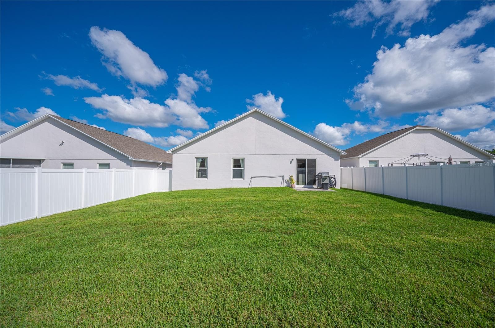 A rear view of the home. - 1279 PINTAIL PL, LAKELAND