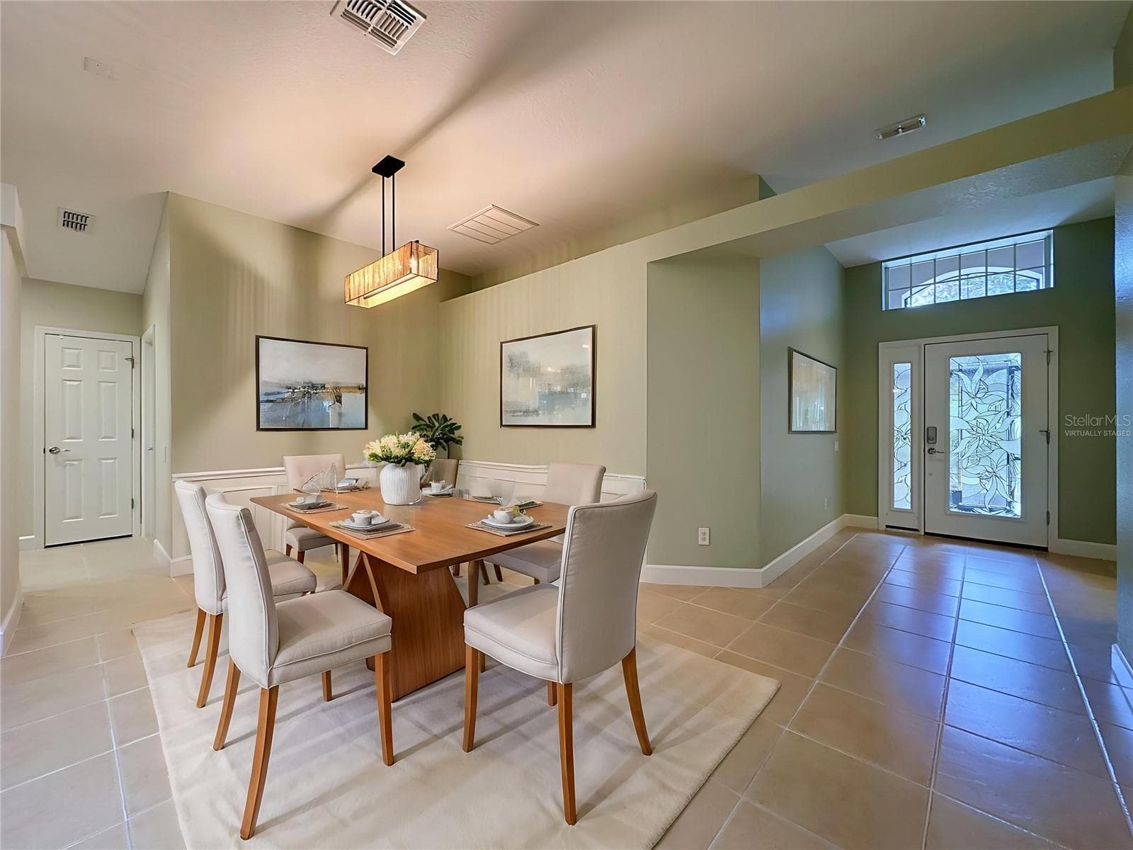 Virtually Staged dining area - 516 PLAYA DR, DAVENPORT